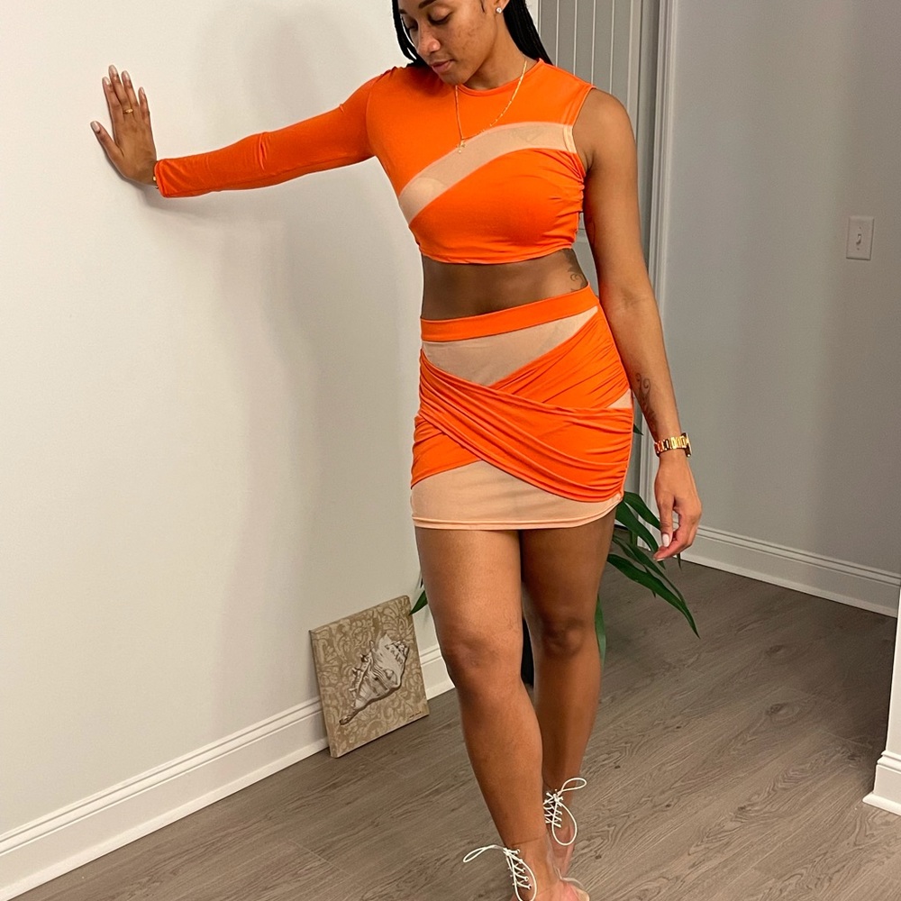 Two piece orange and cream skirt set!